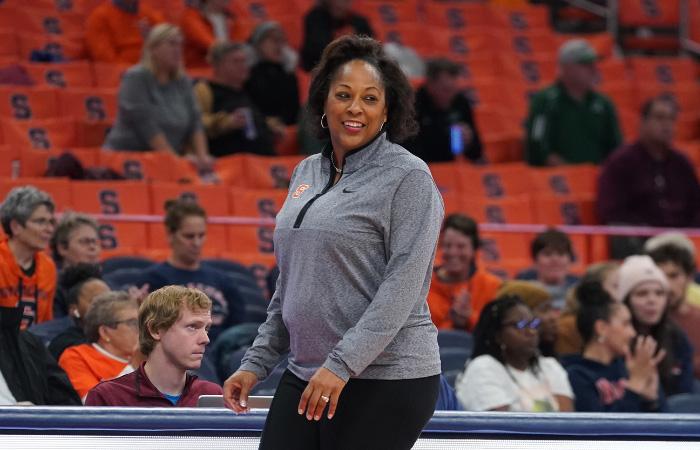 Women's Basketball Coach Legette-Jack smiling on the court